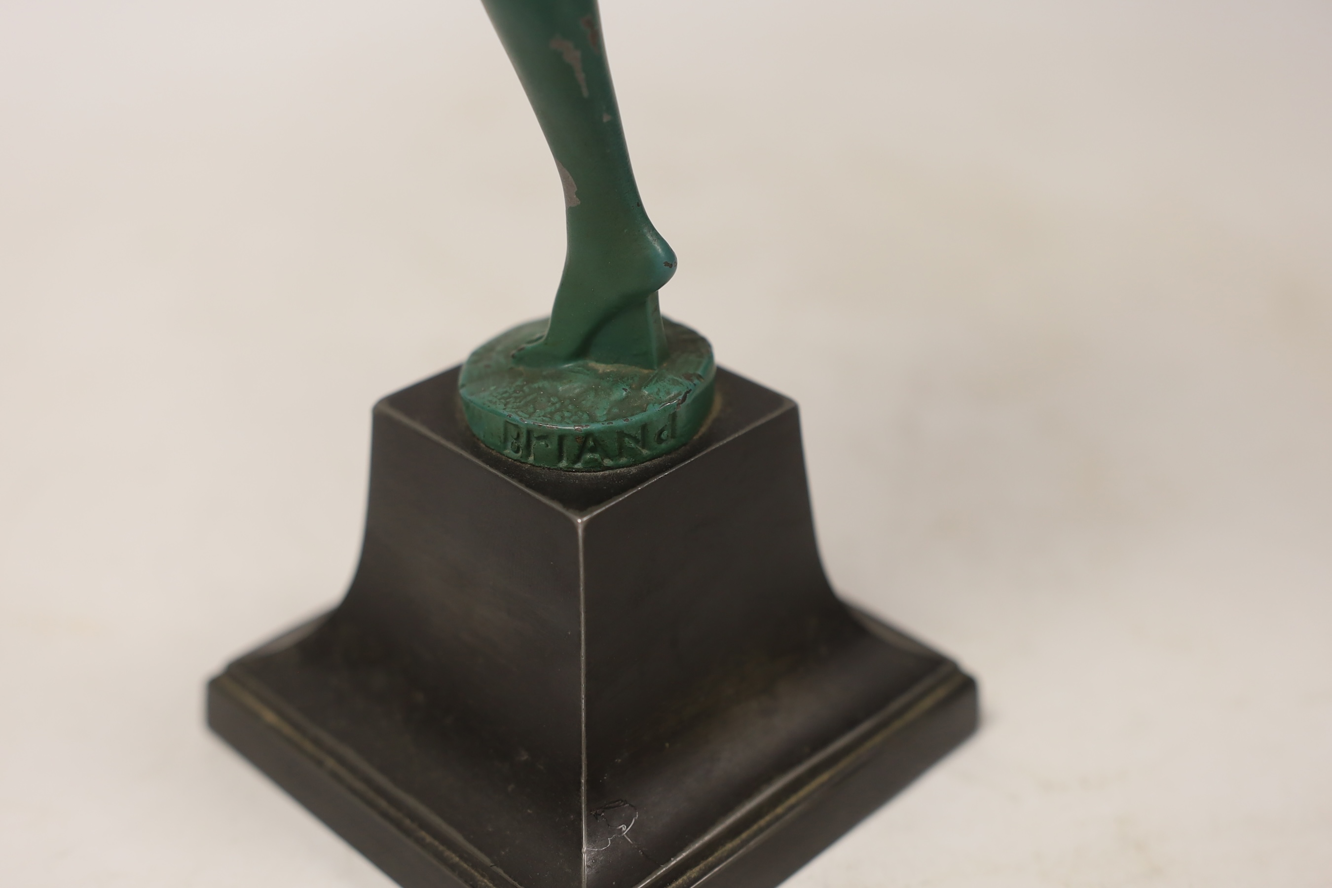 An Art Deco spelter model of a hoop dancer, signed Briand, 29cm